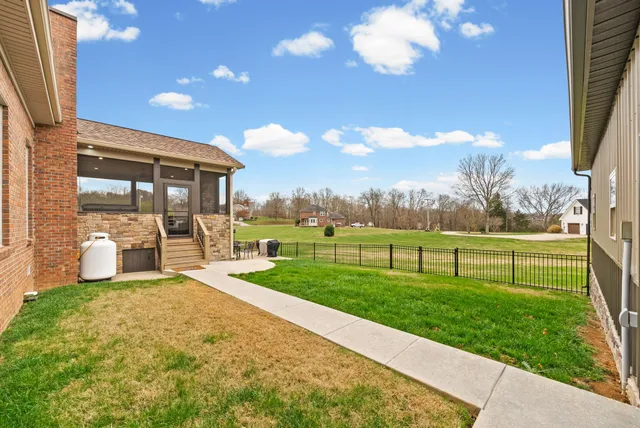 a view of a house with a big yard
