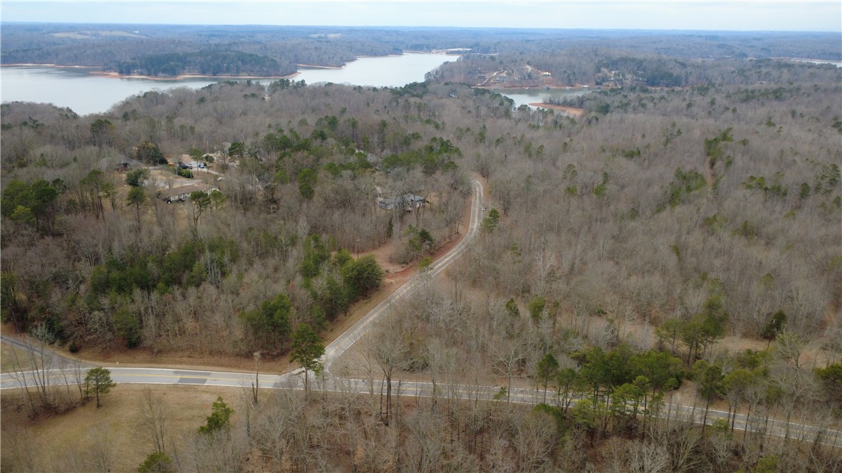 434 Rock Hill Road Fair Play, SC 29643 - Photo 3 of 11 This serene, wooded landscape offers scenic views and easy access to a nearby lake, perfect for building your dream home.