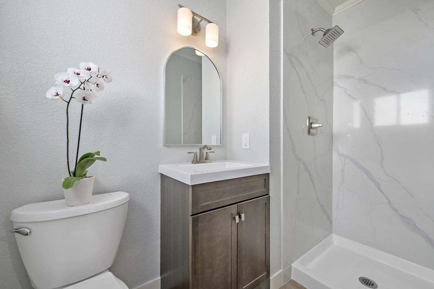 707 River View Drive San Jose, CA 95111 - Photo 8 of 12 a bathroom with a sink toilet and shower