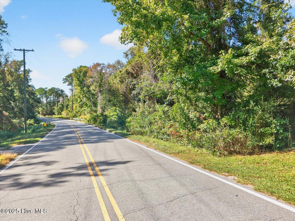 2340 Boones Neck Road Southwest Supply, NC 28462 - Photo 22 of 35 Paved road frontage offers convenient access to this expansive 49-acre development opportunity near Holden Beach.