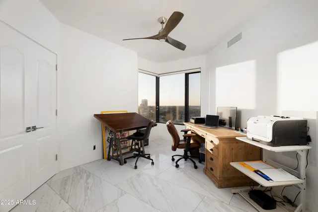 a room with furniture and a window