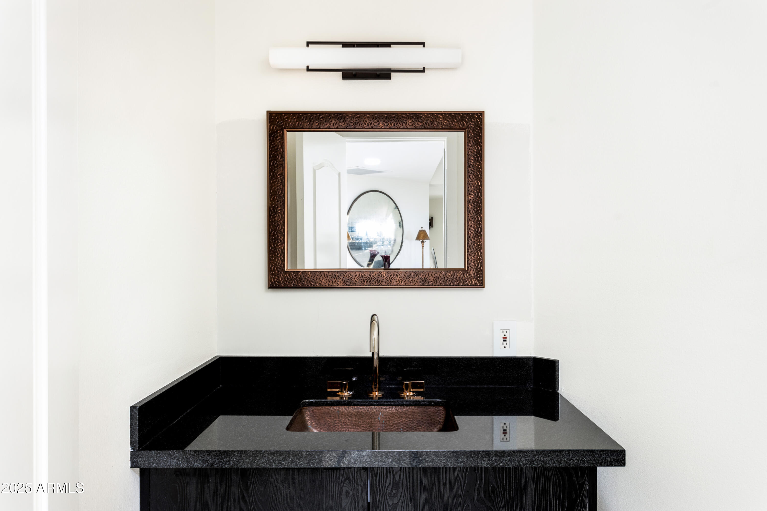 1040 East Osborn Road, Unit 904 Phoenix, AZ 85014 - Photo 18 of 22 a living room with furniture and a fireplace