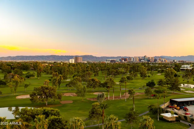 a view of residential houses with outdoor space