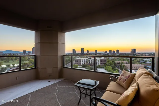 a balcony with furniture