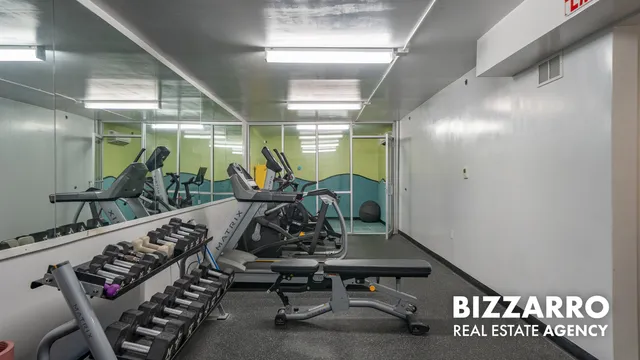 a view of a room with gym equipment