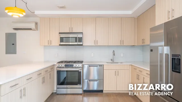 a view of a workspace with furniture