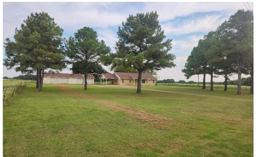 View of grassy yard featuring a view of countryside