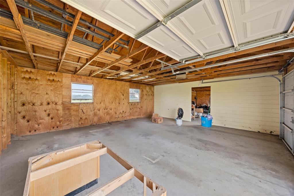 4121 Tokio Road West, TX 76691 - Photo 20 of 21 Garage featuring wood walls