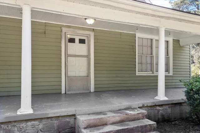 a view of house with outdoor space