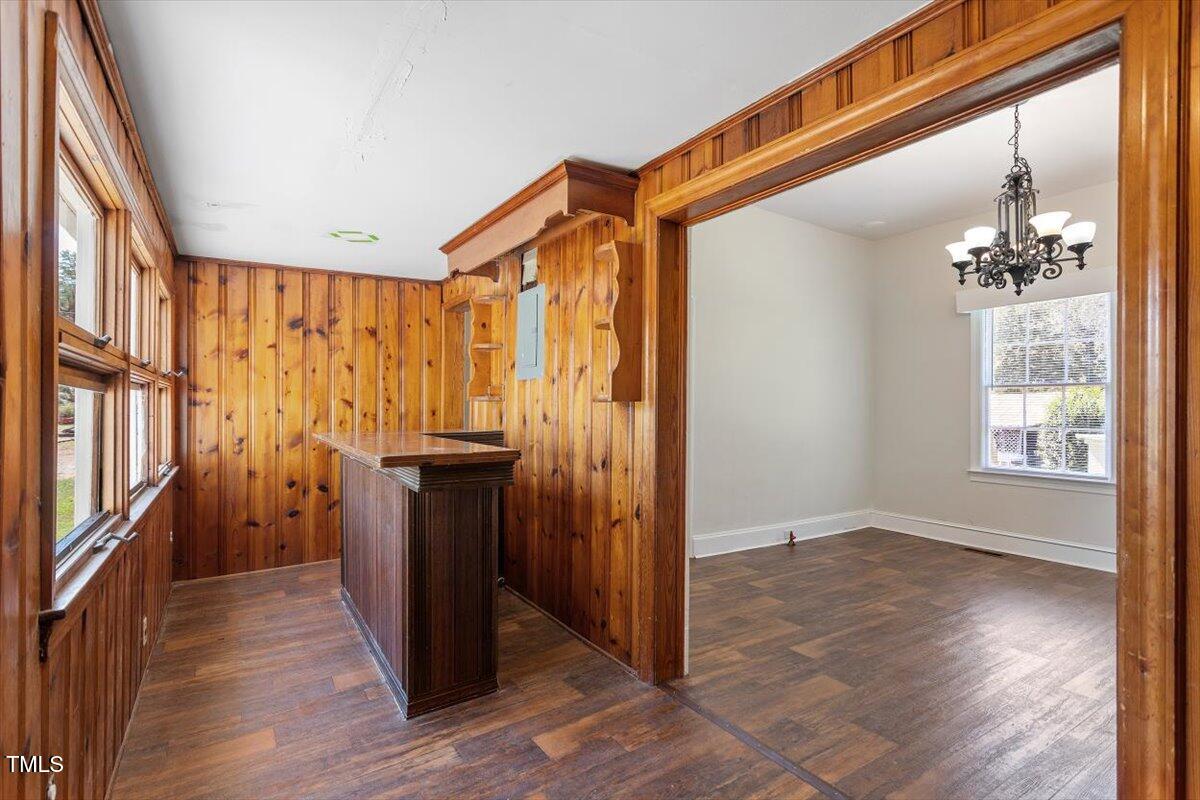 123 King Road Warrenton, NC 27589 - Photo 10 of 24 wooden floor in an empty room with a window
