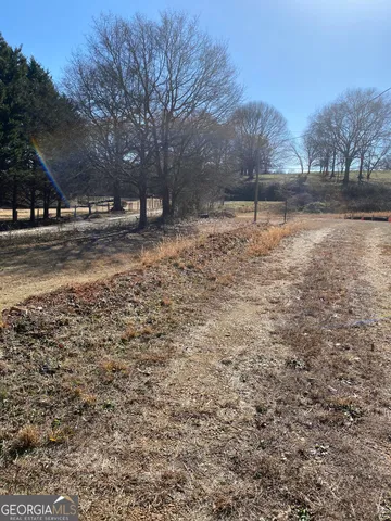a view of road and trees
