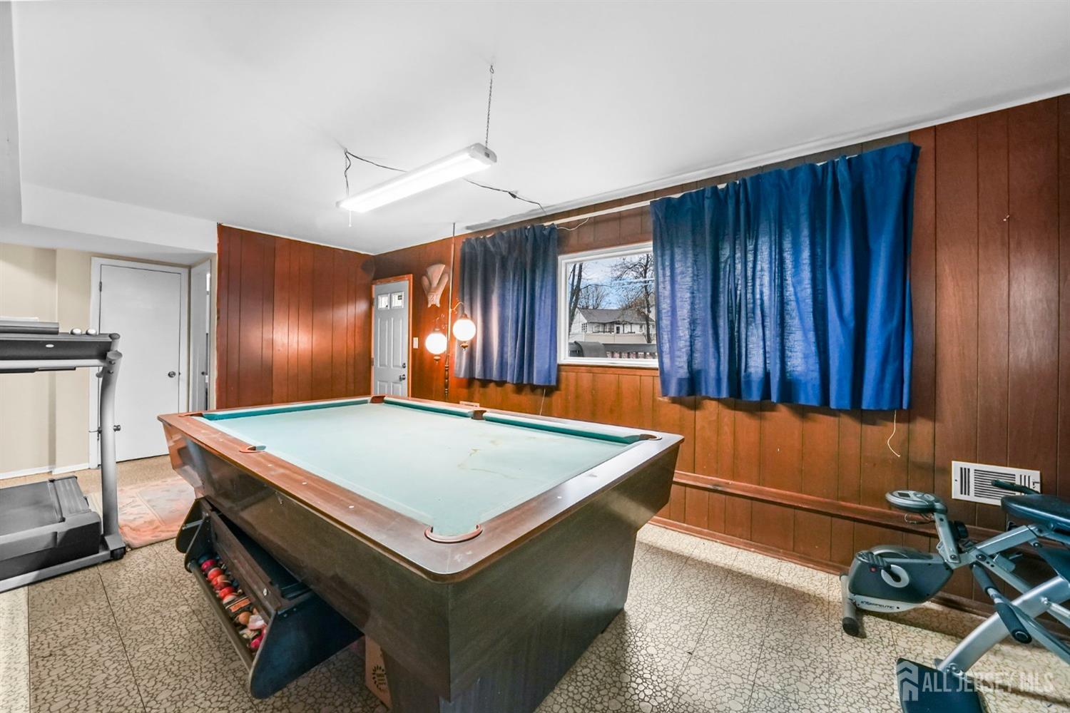 102 Aberdeen Road Matawan, NJ 07747 - Photo 23 of 32 a room with pool table and windows