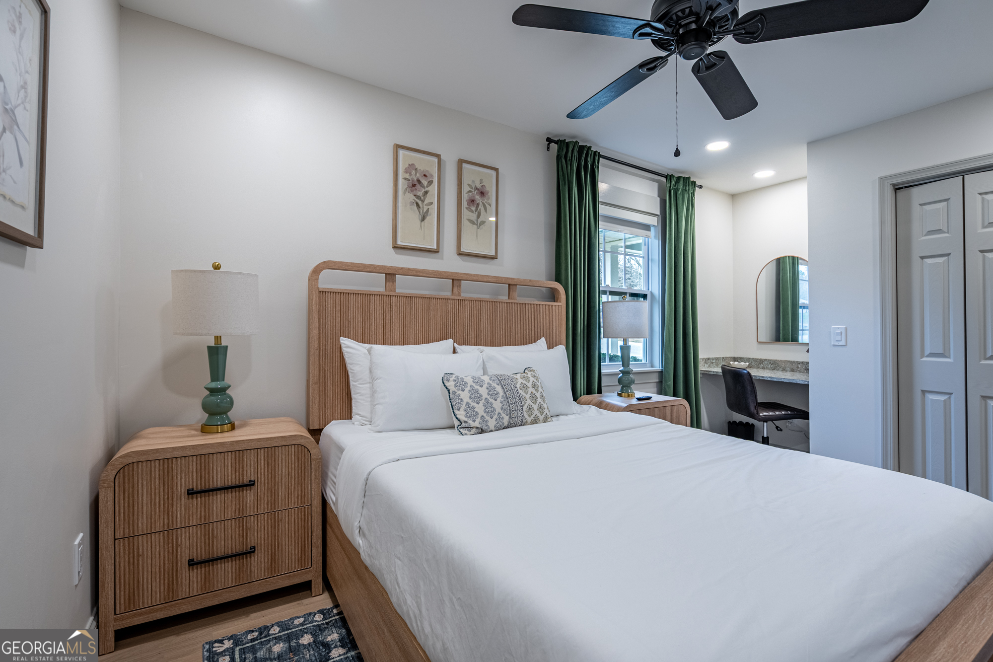 26 Jennifer Lane Rydal, GA 30171 - Photo 19 of 35 a bedroom with a bed and a chandelier