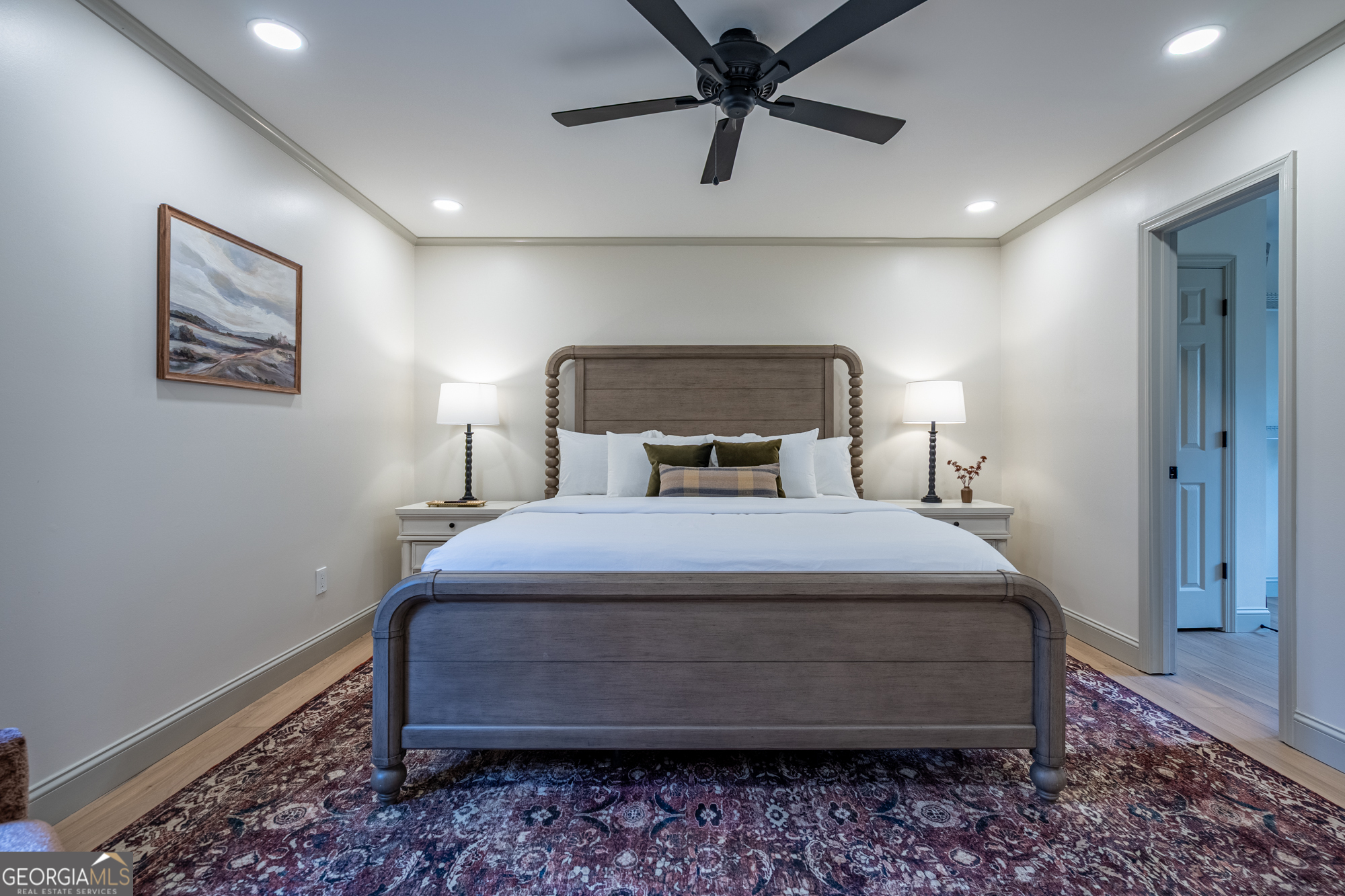 26 Jennifer Lane Rydal, GA 30171 - Photo 24 of 35 a bedroom with a bed and a chandelier