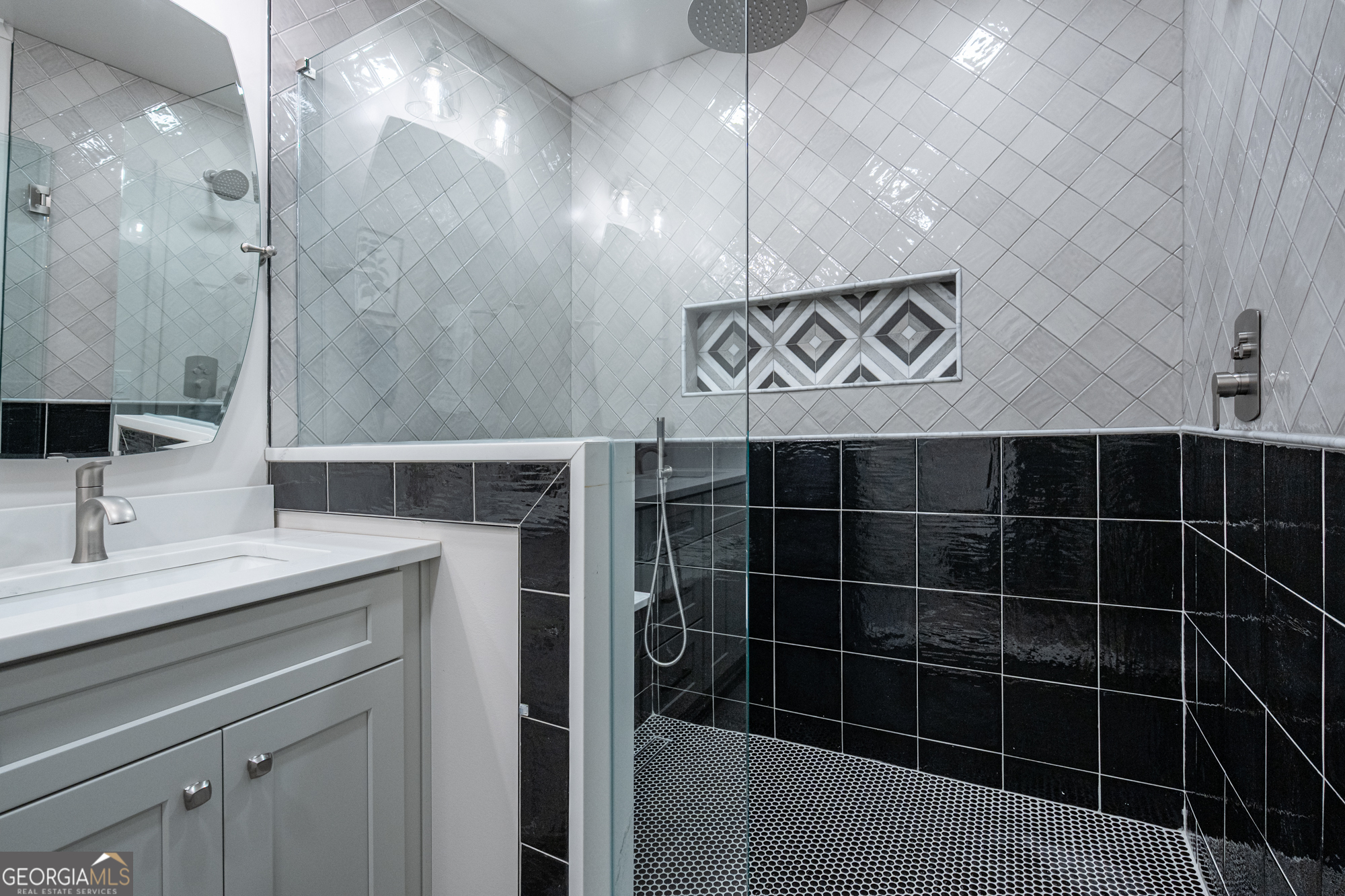 26 Jennifer Lane Rydal, GA 30171 - Photo 28 of 35 a bathroom with a sink a vanity and a shower