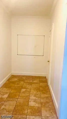 a view of a room with an empty space