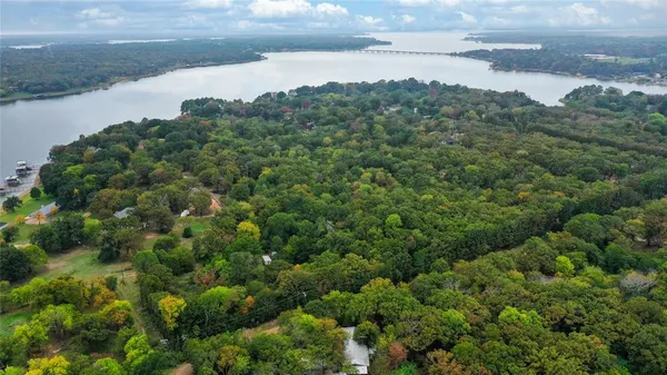 a view of a lake from a yard