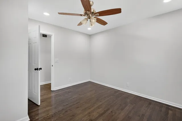 a view of a porch with wooden floor