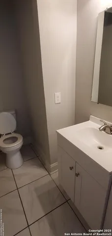 a bathroom with a sink and a toilet