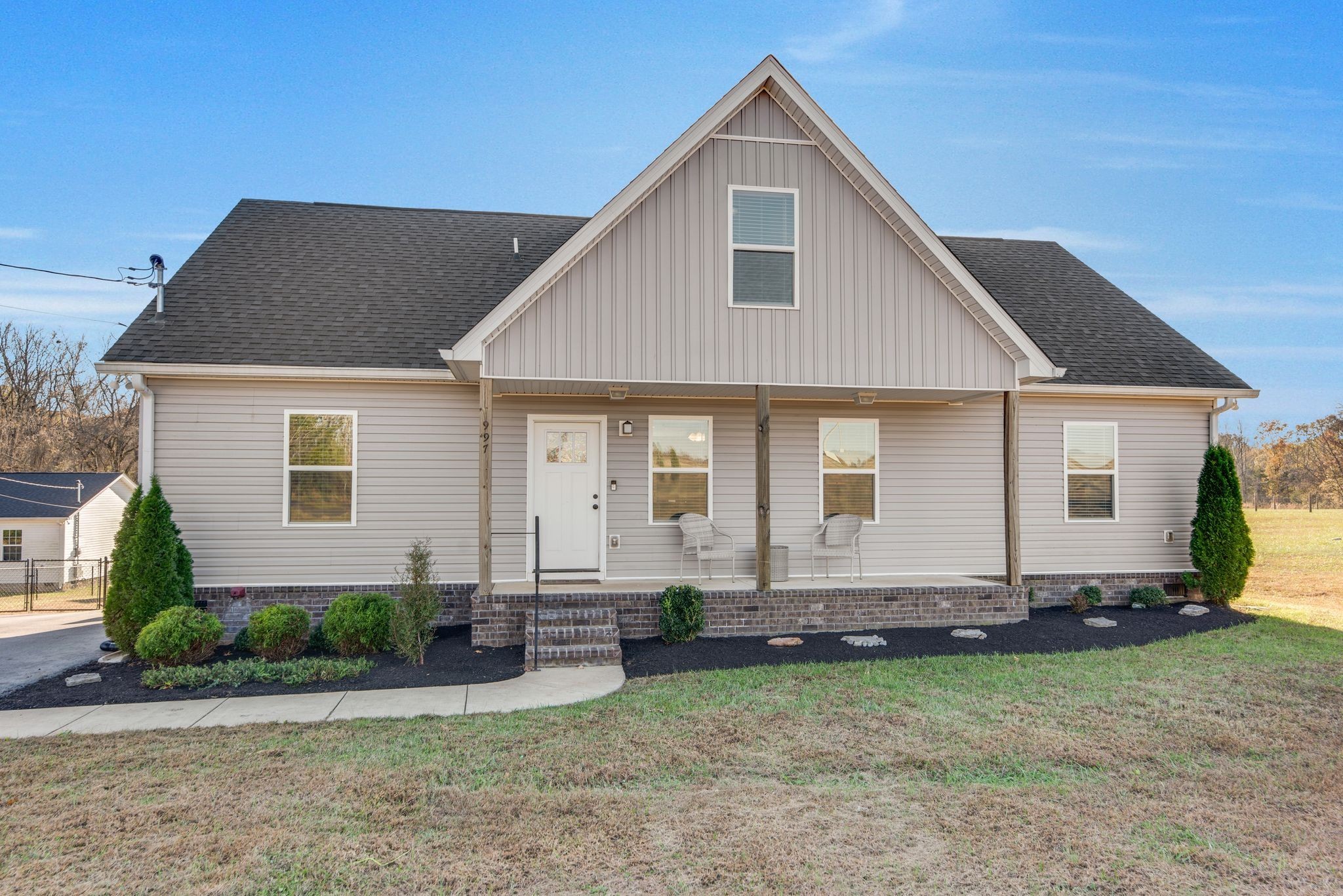 a front view of house with yard