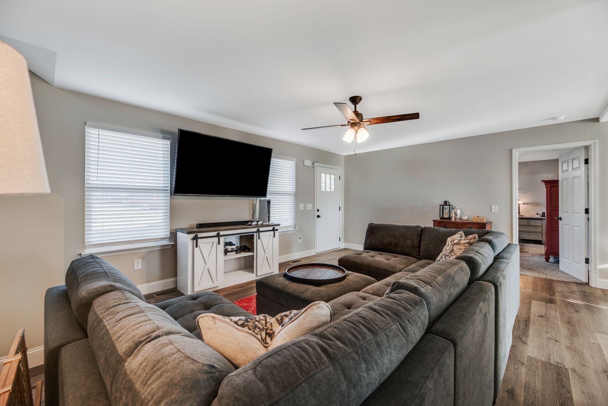 997 State Highway 99 Waynesboro, TN 38485 - Photo 11 of 33 a living room with furniture and a flat screen tv