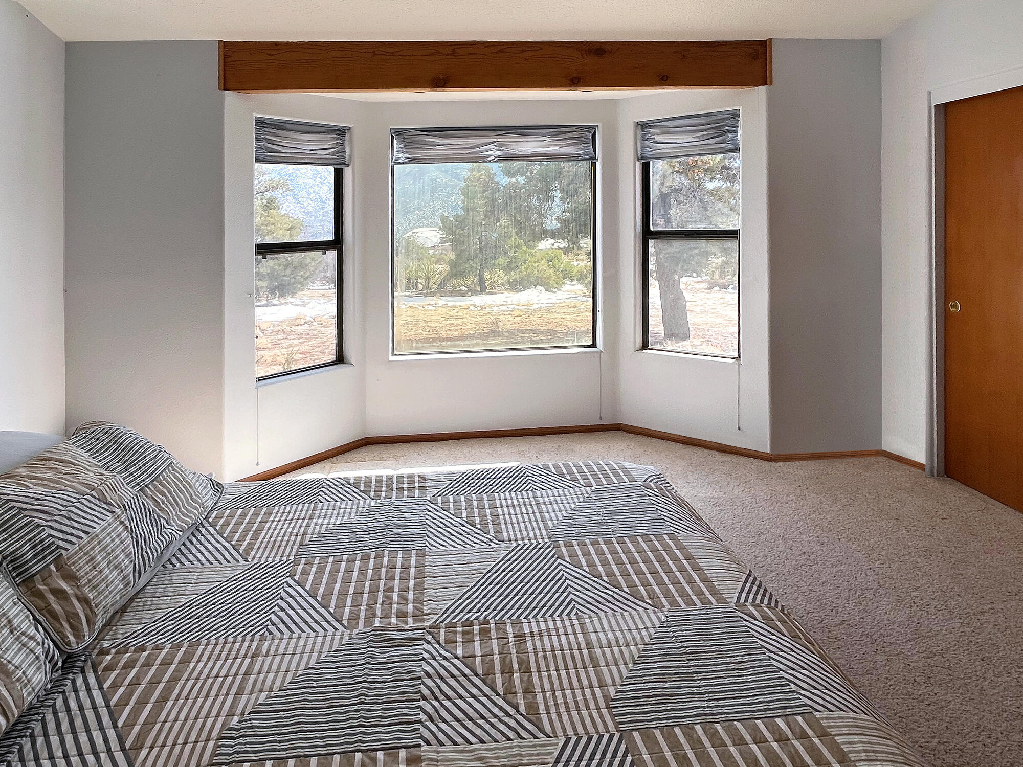 70120 San Lorenzo Road Mountain Center, CA 92561 - Photo 6 of 14 a view of a bedroom with a bed and a window