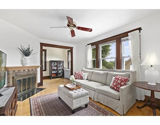 5 Hillside Avenue Wakefield, MA 01880 - Photo 4 of 10 a living room with furniture and a fireplace