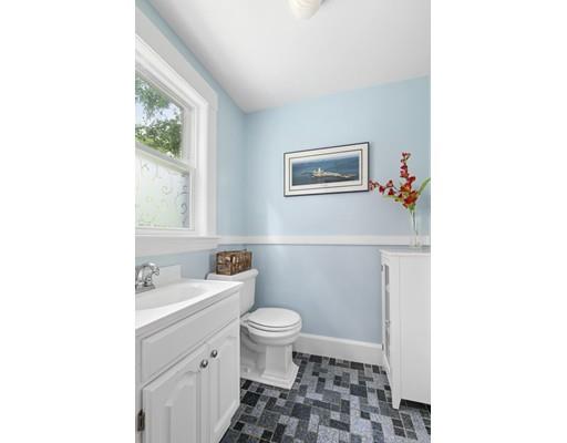 5 Hillside Avenue Wakefield, MA 01880 - Photo 6 of 10 a bathroom with a toilet a sink and a mirror