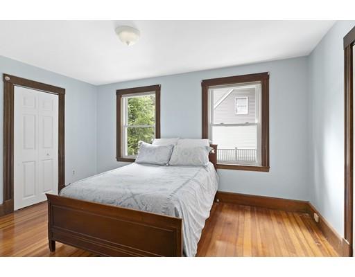 5 Hillside Avenue Wakefield, MA 01880 - Photo 7 of 10 a bedroom with a bed and a window