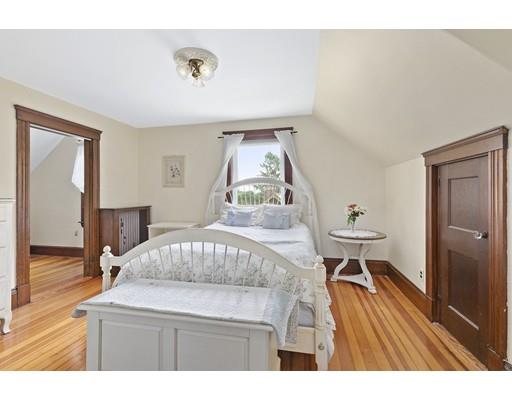 5 Hillside Avenue Wakefield, MA 01880 - Photo 8 of 10 a living room with a couch and a table