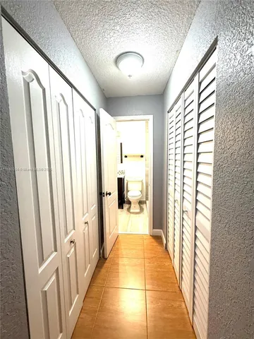 a hallway with a large window