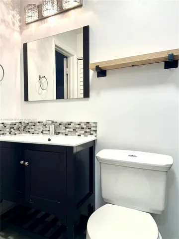 a bathroom with a sink and a toilet