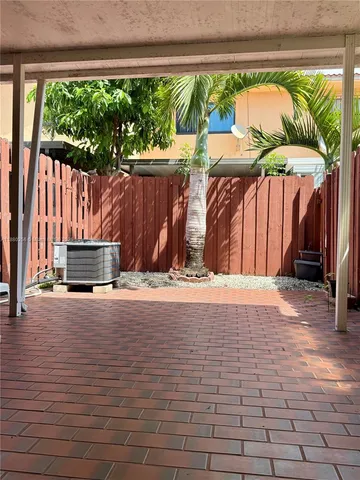 a view of outdoor space with a patio