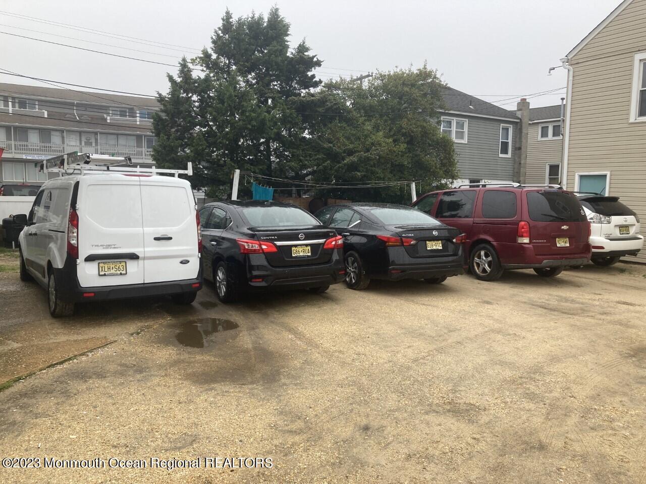 1805 Ocean Boulevard Seaside Park, NJ 08752 - Photo 3 of 6 a view of a cars parked in a parking lot