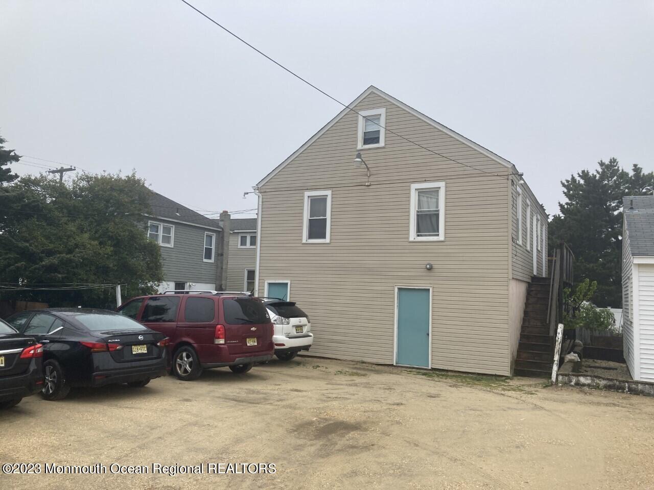 1805 Ocean Boulevard Seaside Park, NJ 08752 - Photo 5 of 6 a view of a yard in front of house