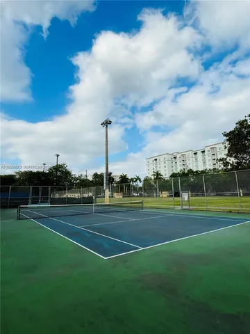 a view of a golf course with a lake