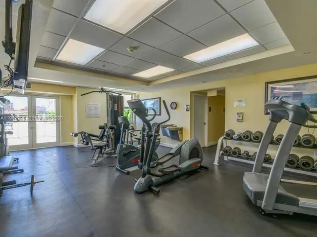 a view of a room with gym equipment