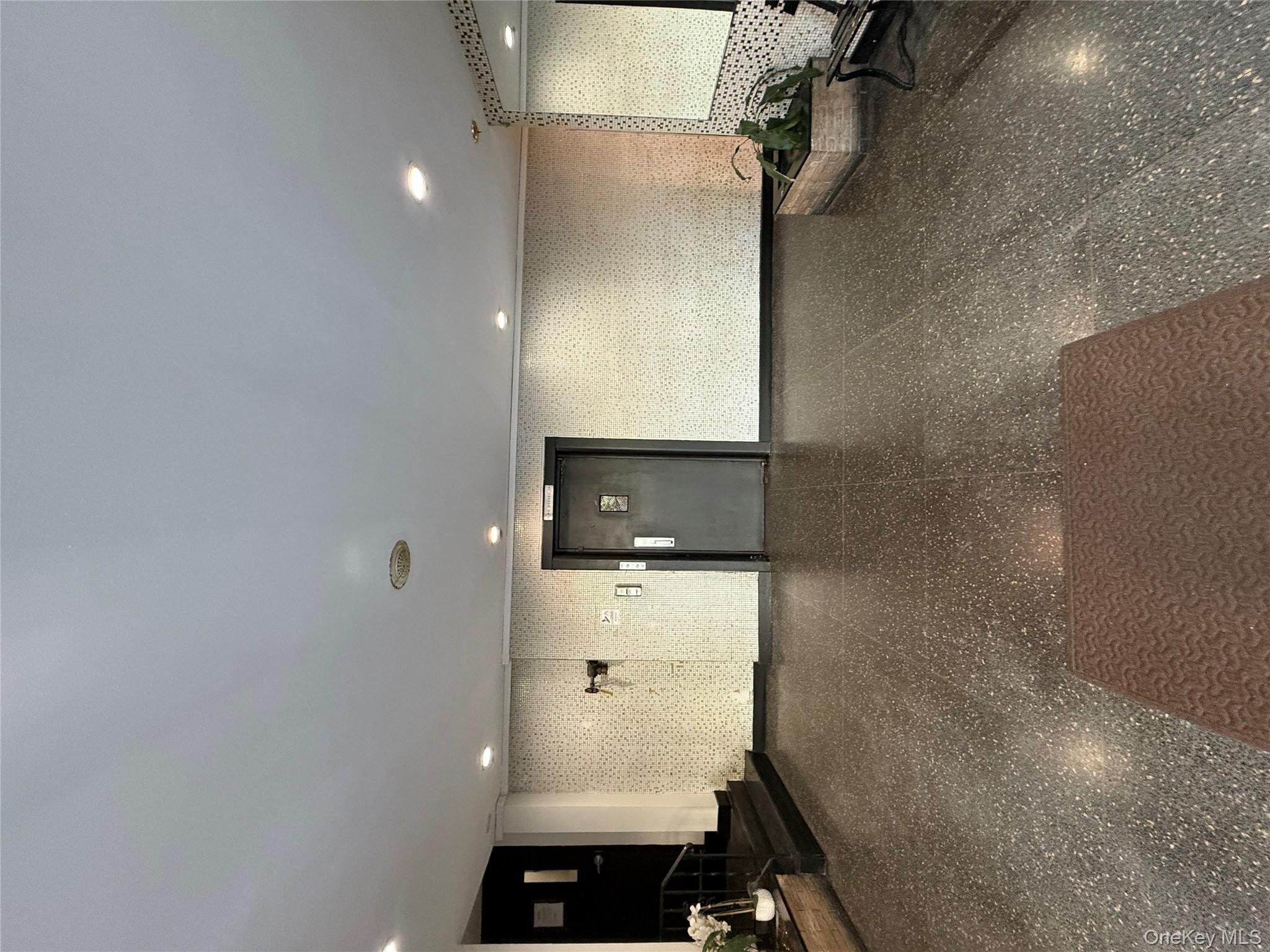 143 Bruce Avenue, Unit 7A Yonkers, NY 10705 - Photo 2 of 8 a view of empty room with windows