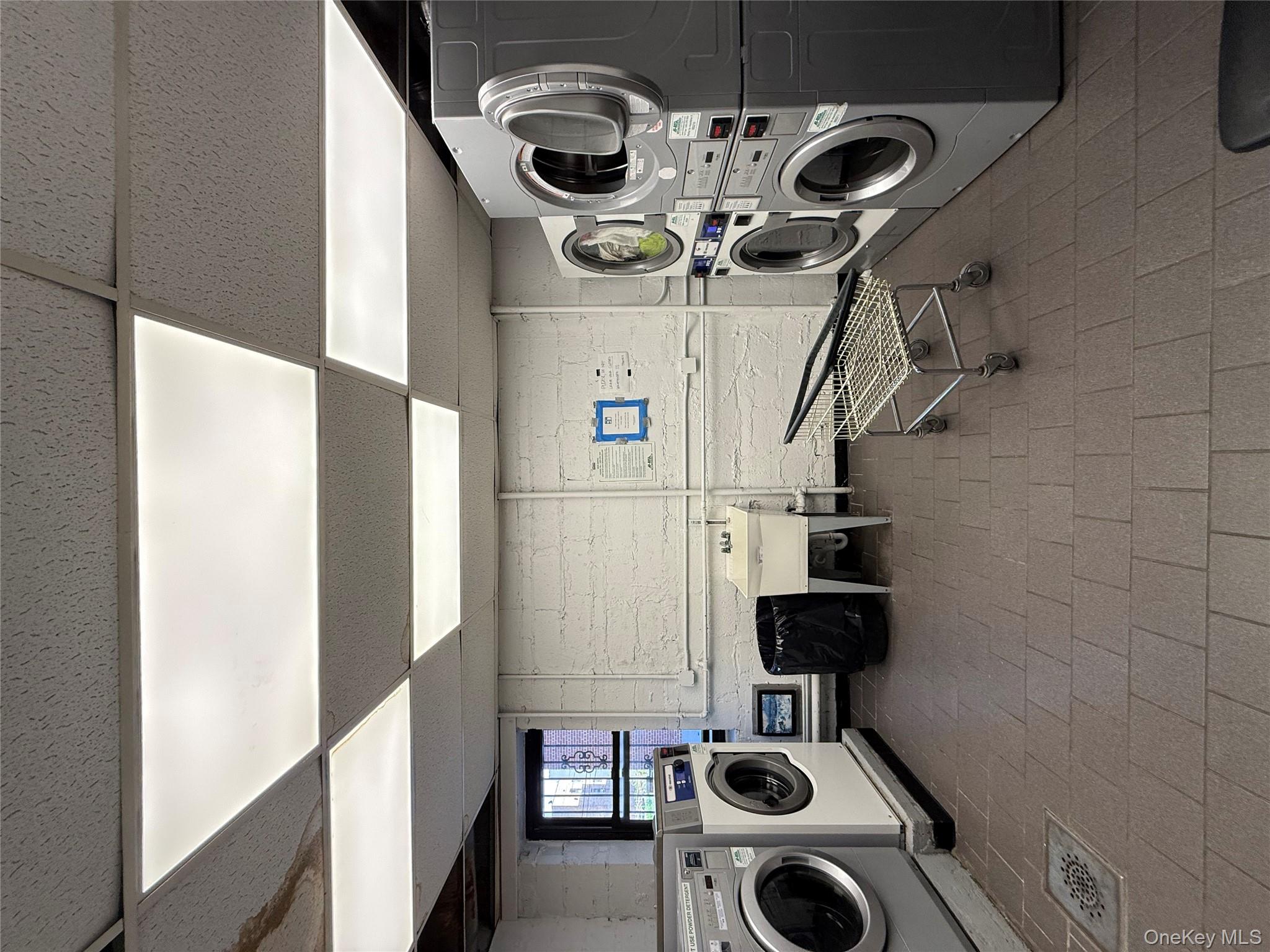 143 Bruce Avenue, Unit 7A Yonkers, NY 10705 - Photo 7 of 8 a utility room with dryer and washer