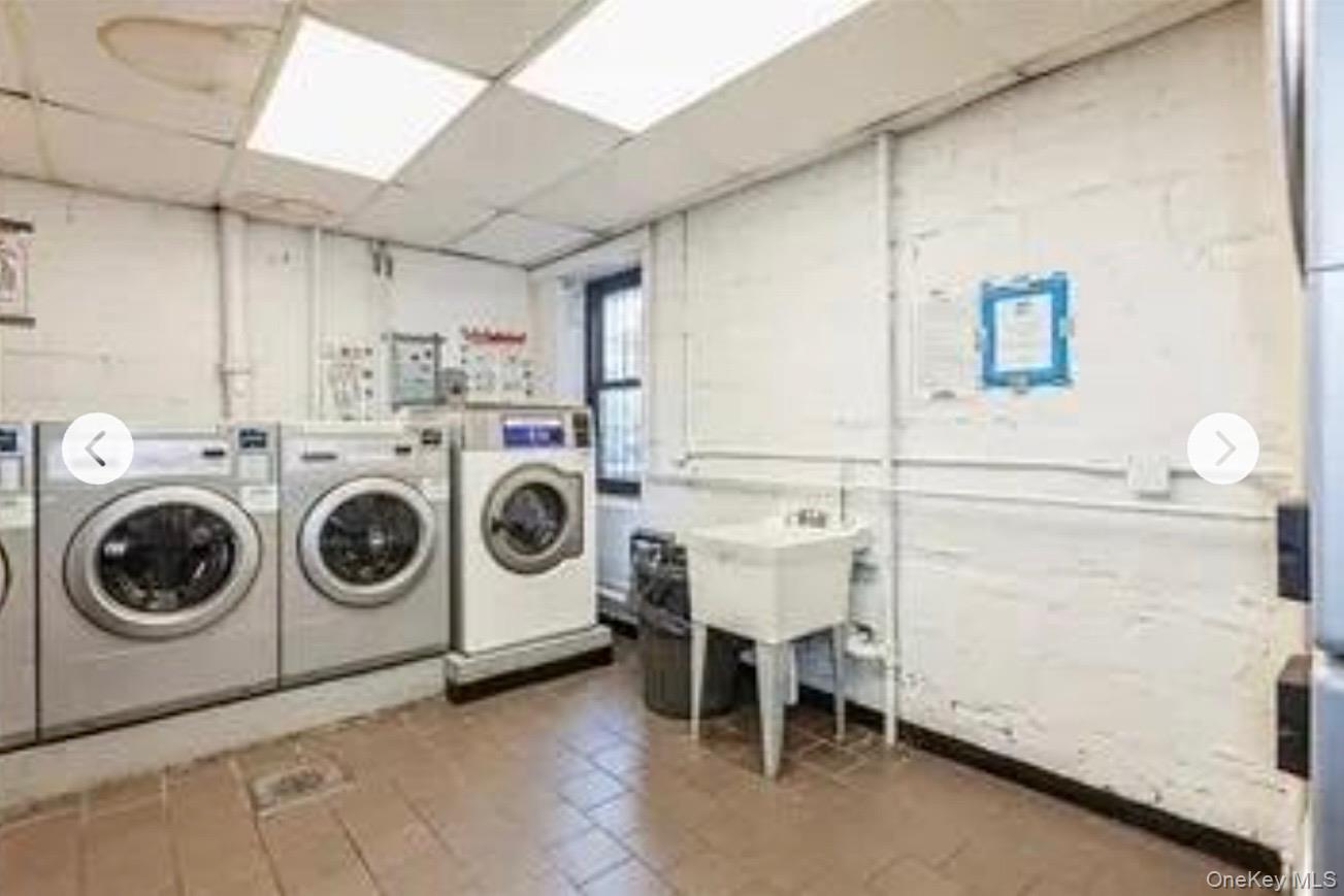 143 Bruce Avenue, Unit 7A Yonkers, NY 10705 - Photo 8 of 8 a utility room with dryer and washer