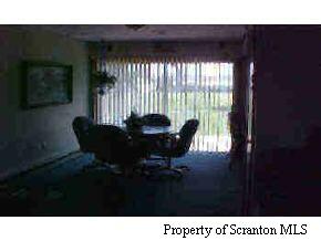 107 Miller Road Clarks Summit, PA 18411 - Photo 3 of 5 a black and white photo of a living room