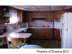 107 Miller Road Clarks Summit, PA 18411 - Photo 4 of 5 a kitchen with a sink and cabinets