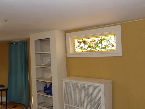 a room with toys and dresser