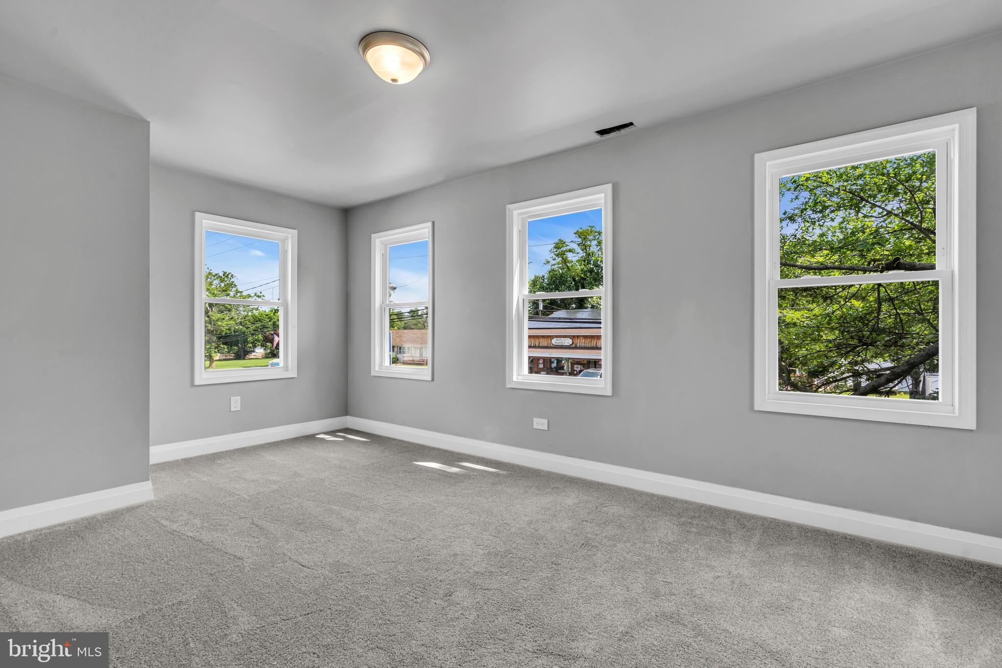 19 East Main Street Salem, NJ 08079 - Photo 17 of 28 an empty room with windows and closet