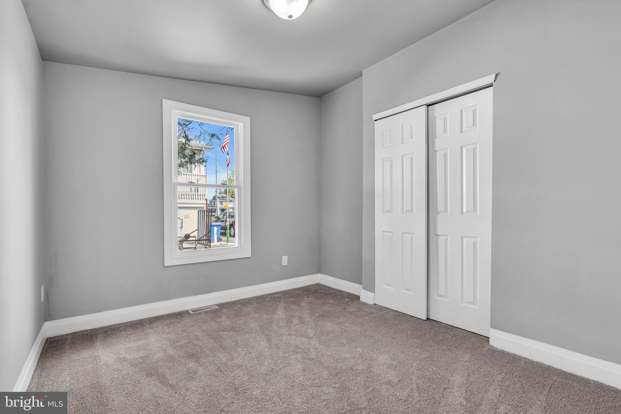 19 East Main Street Salem, NJ 08079 - Photo 10 of 28 an empty room with windows and closet