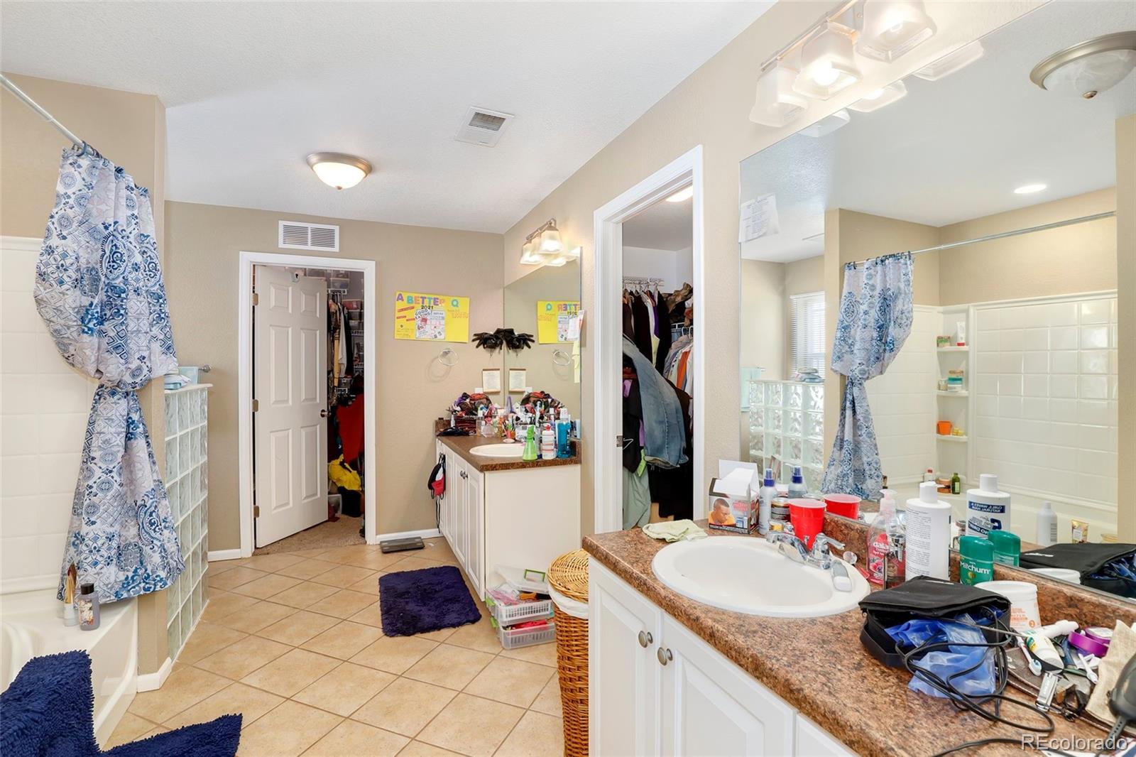 5380 Liverpool Street Denver, CO 80249 - Photo 21 of 30 a very nice looking room with a large window
