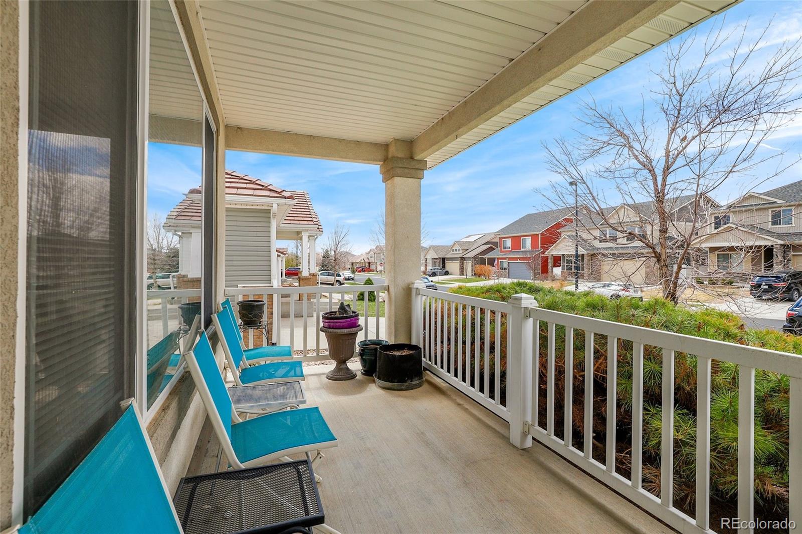 5380 Liverpool Street Denver, CO 80249 - Photo 29 of 30 a view of a balcony with chairs