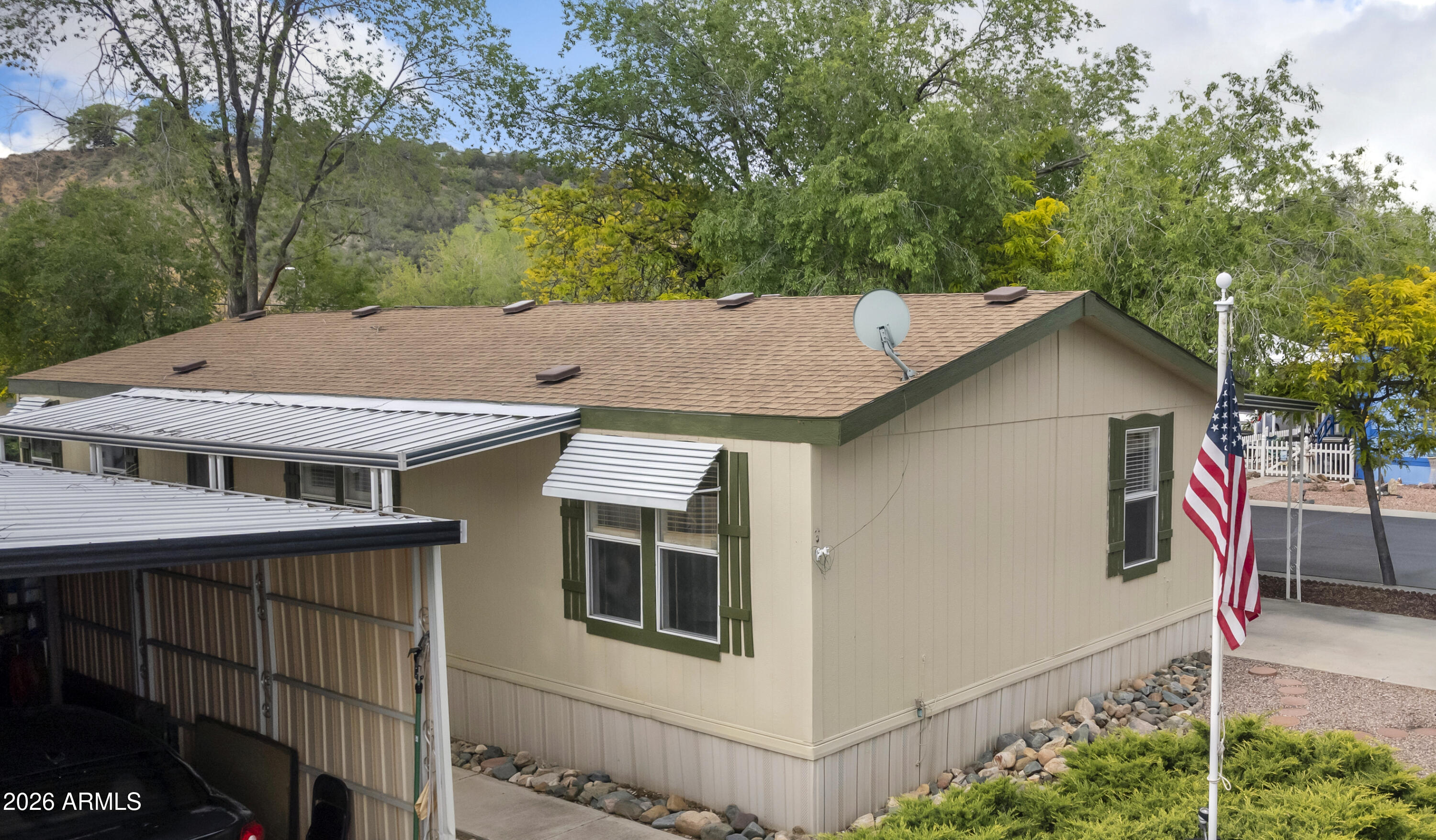 11250 East State Rte 69, Unit 1125 Dewey, AZ 86327 - Photo 44 of 45 a aerial view of a house with a yard and balcony