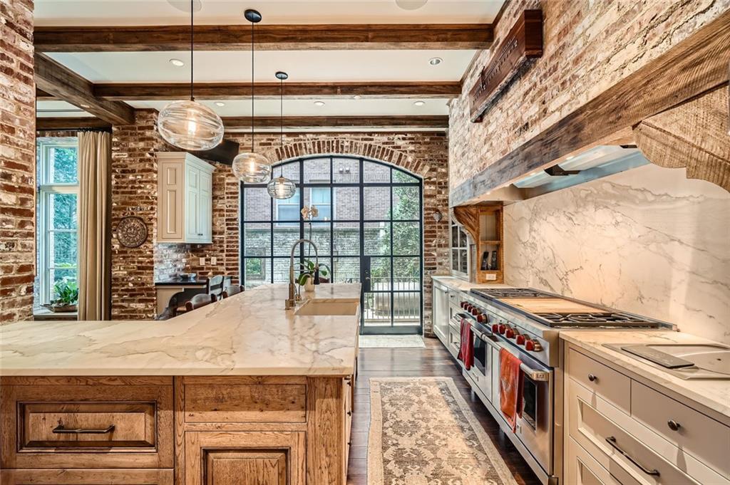 2440 Peachtree Road Northwest, Unit 9 Atlanta, GA 30305 - Photo 11 of 48 a open kitchen with a stove and a white roof