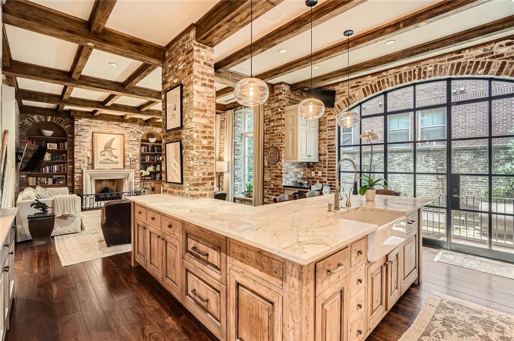 2440 Peachtree Road Northwest, Unit 9 Atlanta, GA 30305 - Photo 13 of 48 a large white kitchen with a large window